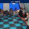 عاملون في مخيم 