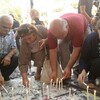 •	وفد من منظمة حمورابي لحقوق الإنسان يزور موقع جريمة الكرادة ويشعل الشموع ويرفع الصلوات على أرواح الشهداء