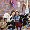 وزيرة الهجرة تشارك النازحين في مخيمات الموصل مائدة الإفطار في الشهر الفضيل