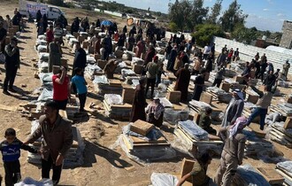 الهجرة توزع 3 آلاف حصة إغاثية بين النازحين في صلاح الدين